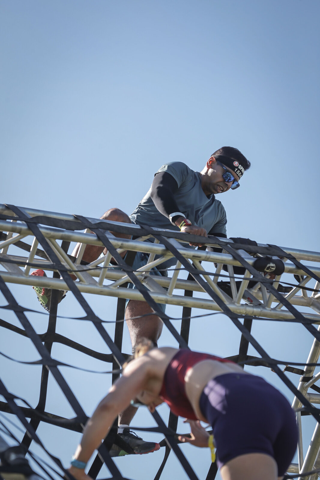 NorCal Spartan Super August 2026 — climbing over the cargo net