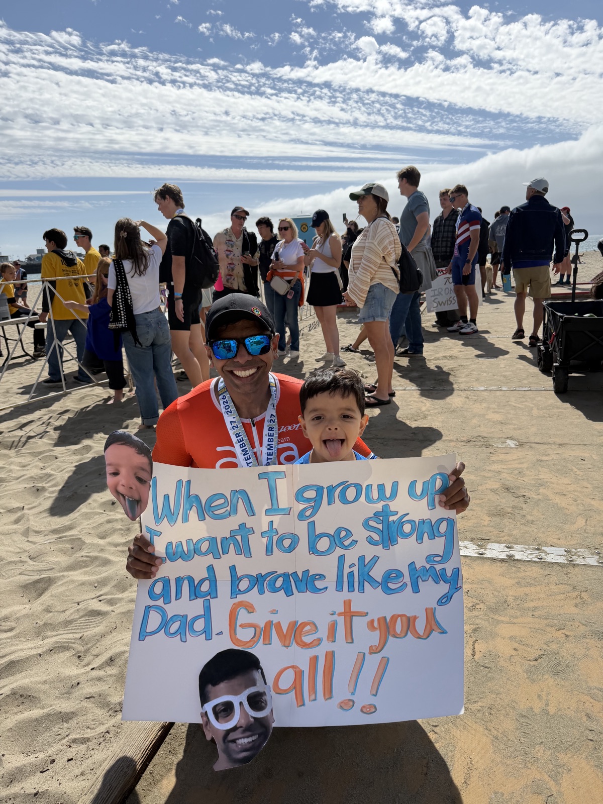 Family celebrating on the beach after the September 2026 Santa Cruz Triathlon
